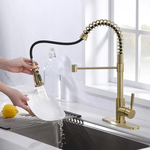 Brushed Gold Kitchen Faucet With Dual Function Pull Out And Pull Down Sprayer, featuring no-fuss installation and wide reach spout in use