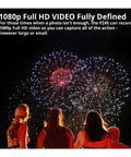 Celebrating with fireworks at night, showcasing the Easy Peasy Pastel Pink 16MP Point And Shoot Camera With 1080P Full HD Video.
