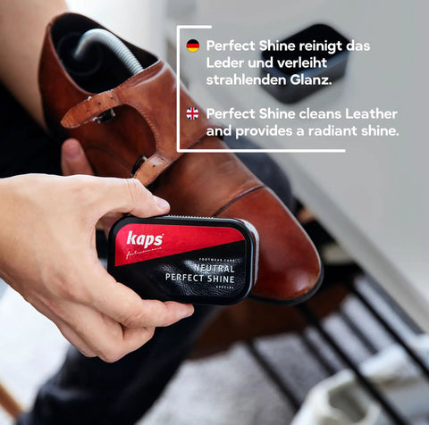 Instant Black Shoe Shine Sponge For Leather Shoes And Boots Delivers Legit Quick Polish Action With A Slick No Sweat Shine That Keeps Your Kicks Lookin Fresh Without Any Messy Hassle, held above polished brown shoe.