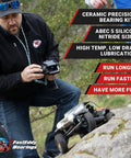 Man operating RC car with Mercedes CLK GTR TL 01 Ceramic Rubber Sealed Bearing Kit Upgrade For RC Cars in rocky terrain