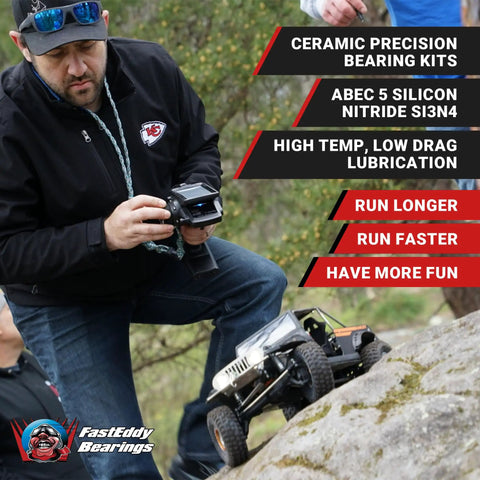 Man operating RC car with Mercedes CLK GTR TL 01 Ceramic Rubber Sealed Bearing Kit Upgrade For RC Cars in rocky terrain