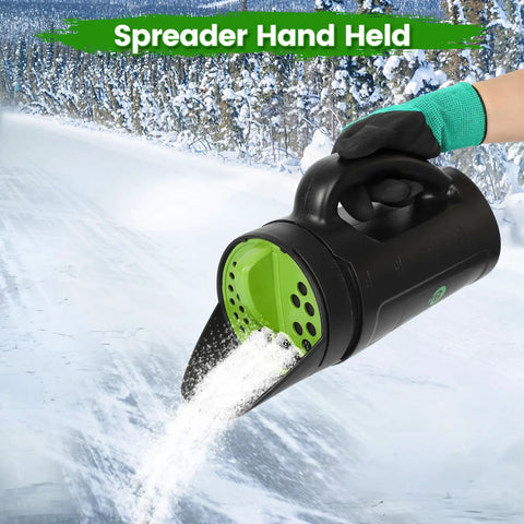 All Purpose Hand Spreader Shaker With Adjustable Opening Sizes And Flow Dial For Even Distribution Of Grass Seed Fertilizer Salt Ice Melt Up To 80 Oz Perfect For Lawn Care Gardening And Winter Driveway Maintenance in use on snowy path.