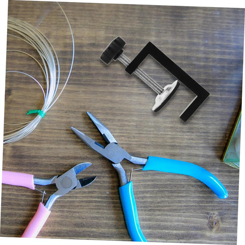 Two Pack Adjustable Outdoor Furniture Clips Sturdy No Slip Fasteners for Wicker Sofas and Chairs shown with pliers and wire