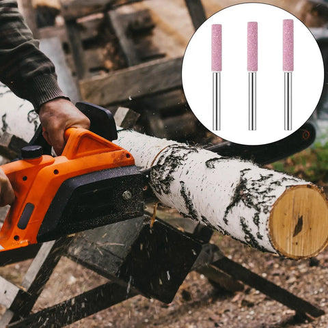 24 Piece Chainsaw Sharpening Bits Set In 5/32 Inch, 3/16 Inch, And 7/32 Inch for polishing and grinding chains, visible on log