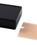 Black ABS Electronics Box With Removable End Panels And FR4 PCB, 2.6 by 2.6 by 1.1 Inches, shown with PCB beside it