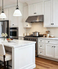 Matte Black Round Euro Style Cabinet Knobs One And One Quarter Inch 30 Pack on white kitchen cabinets and drawers