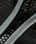 Close-up of zip front and mesh detail of Men's Black High Visibility Safety Vest With Zip Front And Cargo Pockets Class 2 Reflective Work Vest.