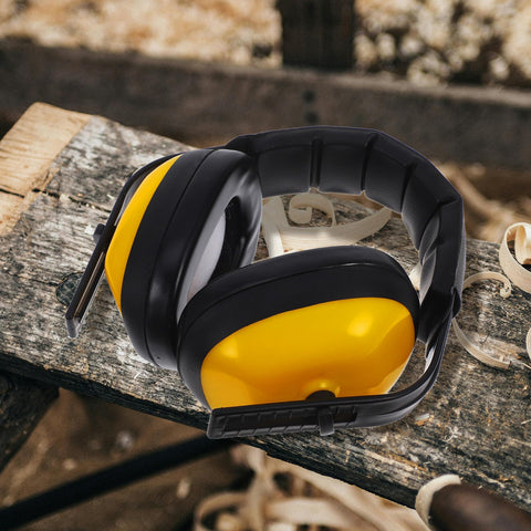 Adjustable Yellow Noise Blocking Ear Defenders For Shooting And Industrial Jobs With Slap Up Soundproof Earmuffs For Studying Ranges And Everyday Hearing Protection displayed on a wooden surface.