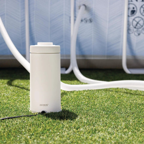 Powerful Cartridge Filter Pump for Above Ground Pools: Delivers 530 GPH Flow Rate with Built-in Auto Timer, shown on grass near pool