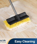 Extendable Deck Brush With Four Section Handle For Outdoor Decks And Patios, 53.9 Inch Reach in use on wooden floor