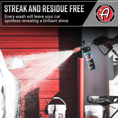 Person using PH Neutral Car Wash Soap For Snow Foam Cannon And Pressure Washer 5 Gallon Bucket to wash a car, spraying foam