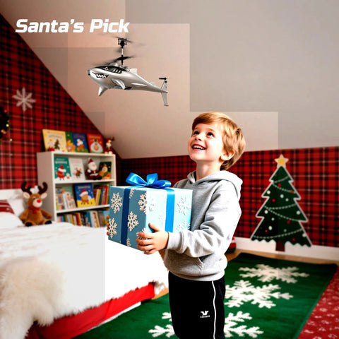 Child holding a wrapped gift with Shark Themed RC Helicopter For Kids And Adults With Altitude Hold One Key Takeoff in bedroom.