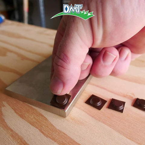 Hand placing non-slip base on Dia Sharp Bench Stone Diamond Knife Sharpener, 8 x 3 x 0.38 inches, USA made, on workbench
