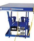 Pro Grade Electric Hydraulic Lift Table With 36 By 84 Inch Platform And 4000 Pound Heft showing motor and control, welded steel construction.