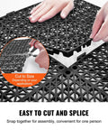 Close-up of hands assembling Interlocking Drainage Floor Tiles 55 Pack 12 by 12 Inches Non Slip Soft PVC Mats for wet areas.