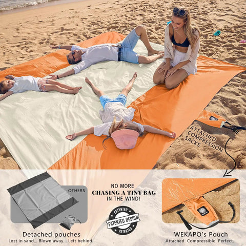 Family using Sandproof And Waterproof Beach Blanket 7x7 Ft Extra Large Mat With Stakes, orange color, on sandy beach