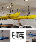 Overhead Pulley Hoist System Pair For Kayaks And Gear 125Lb Capacity Each Space Saving Garage Storage For Canoes Bikes Ladders And More Heavy Duty No Fuss Easy Install, black ceiling straps holding yellow kayaks in garage