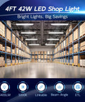 Ten Pack 4ft Linkable LED Shop Light Fixture 4400 Lumens, 42W, 5000K Daylight White illuminating a spacious warehouse