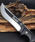 Full Tang Fixed Blade Knife With Two Tone Black And White Blade, Custom Laser Engraving, Nylon Sheath Included on a wood backdrop