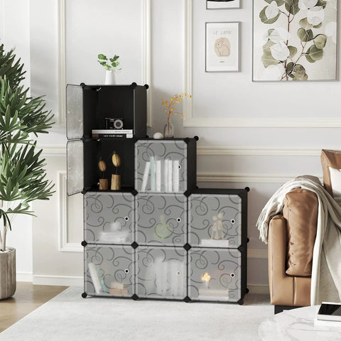Cube Storage Organizer With Doors, 9 Cube Modular Shelves Closet Cabinet in a living room, modern black finish, holding decor items.
