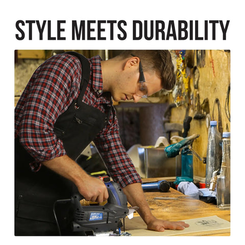 Man wearing Waxed Canvas Welding Apron With Kevlar Thread - Built Tough For Heat And Chemical Resistance in workshop, black, adjustable fit