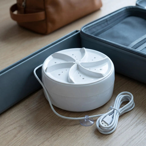Slick Portable Turbo Mini Washer With Dead Quiet Ultrasonic Washing Power For Delicate Socks Underwear And Towels Saves Water On Small Loads, white compact machine.