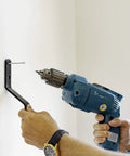 Person using a drill to mount Indoor Acrylic Convex Mirror 18 Inch Round With 160 Degree Wide Angle For Maximum Visibility And Safety