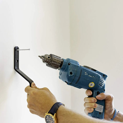 Person using a drill to mount Indoor Acrylic Convex Mirror 18 Inch Round With 160 Degree Wide Angle For Maximum Visibility And Safety