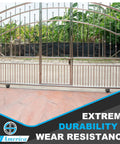Rock Solid And Built Like A Tank 6X2 Inch Cast Iron V Groove Wheel With Steel Housing, Heavy Duty 1000 Lb Load Bearing Roller For Sliding Gate Tracks, Railroad Rails, Industrial Carts And Machinery, Matte Black, 1 Pack, shown on a sliding gate.