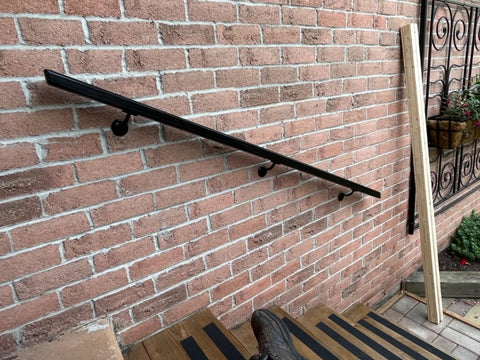 Heavy Duty Hand Rail Bracket Set 6 Pack For Stairs And Banisters, Matte Black Zinc Alloy Wall Mounts installed on brick stairway