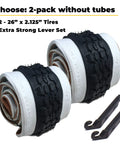 26 Inch White Wall Bicycle Tires For Beach Cruiser And Cruiser Bikes With Or Without Tubes 2 Pack Includes Tire Levers And Upgraded Replacement Parts For A Killer Ride. Image shows rolled tires and levers.