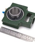 2 Pack UCT208-25 Pillow Block Take-Up Mounted Ball Bearings With 1-9/16 In Bore shown with ruler for scale. Heavy-duty cast iron base.