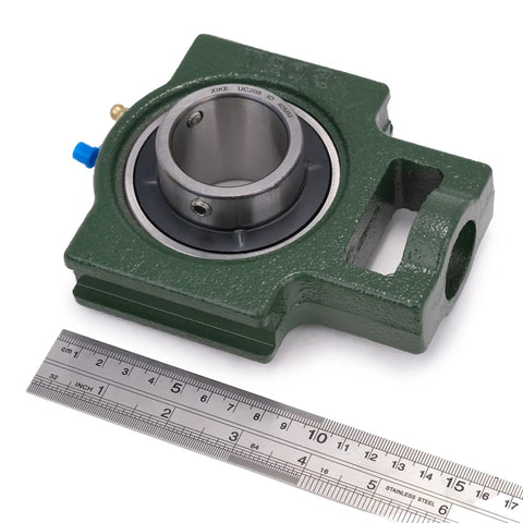 2 Pack UCT208-25 Pillow Block Take-Up Mounted Ball Bearings With 1-9/16 In Bore shown with ruler for scale. Heavy-duty cast iron base.