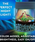 Light Up Dino Terrarium Science Kit For Kids With Multicolor LED Light And Eight Settings, Build A Colorful Mini Dino World, Decorate With Figurines, Rocks, And Stickers, Plant Seeds, Watch It Grow And Glow. Dino terrarium jar with 3 figurines and rocks