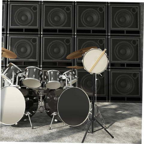 Professional Adjustable Snare Drum Stand and Portable Tripod Rack Built Tough for Indoor Sessions with Dope Stability and Sleek Black Finish for Badass Drummers beside a drum set.