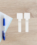 Self Adhesive Cable Straps Keep Your Desk Clean And Tangle Free Bundle Wires Fast With Reusable Hook And Loop Design on wooden desk.