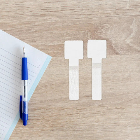 Self Adhesive Cable Straps Keep Your Desk Clean And Tangle Free Bundle Wires Fast With Reusable Hook And Loop Design on wooden desk.