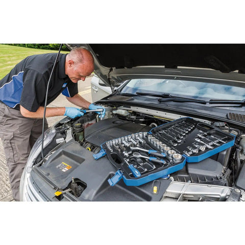Mechanic using Six Point Socket Set With One Quarter Inch, Three Eighths Inch And One Half Inch Square Drive Metric Tool Kit In Blue Case Includes Seventy Two Tooth Reversible Ratchet And Chrome Vanadium Sockets With Satin Finish on car engine