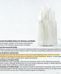 Handcrafted Selenite Lamp With Mountain Peak Design, shown with dimmable knob instruction for optimal lighting use.