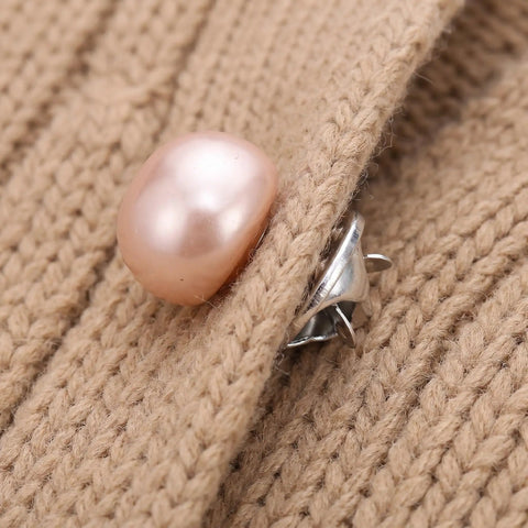 Close-up of 25Pcs No Sew Faux Pearl Brooch Pins Detachable Sweater Clips on a knit fabric for snug fit.