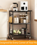 Three-Tier Rolling Cart With 150 Pound Capacity, Lightweight Black Kitchen Storage Cart With Two Lockable Wheels in a kitchen