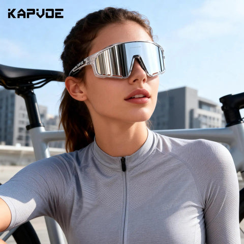 Polarized Cycling Glasses for Men and Women With 3 Interchangeable Lenses, UV400 Protection, TR90 Frame shown in silver while cycling