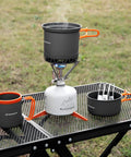 Backpacking Cooking Kit With 1300W Stove 0.6L And 0.8L Pots Canister Stabilizer Spoon Fork Knife 16oz Mug Mesh Carry Bag Grab And Go Camp Kitchen For Hiking And Picnics displayed on a table.