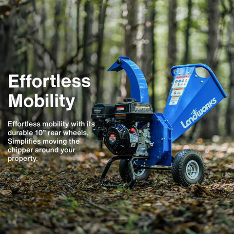 Compact Mini Wood Chipper Shredder Mulcher with 7HP power in forest, large wheels for easy maneuvering, extended chute