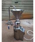 Commercial Peanut Butter Maker Grinder With Vertical Stainless Steel Colloid Mill Emulsifying Machine in a workshop setting