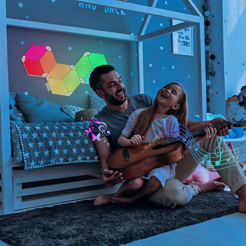 Family playing guitar under Smart Rhombus LED Wall Panels for Gaming Setup, 9 Pack RGB Colorful Rhythm Edition with App Control