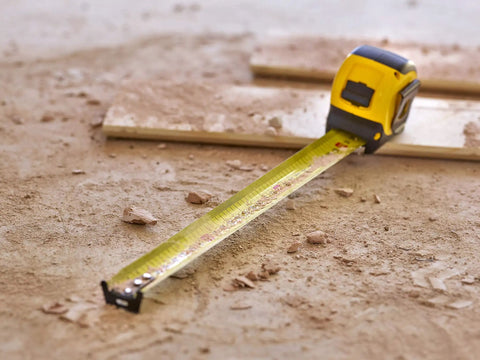 Fatmax Tape Measure With Blade Armor And Dual Scale 8m Length, Mylar coated blade extended on construction site