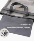 Mesh Shower Caddy Bag Portable Hanging Toiletry Organizer With Zipper showing open gray flap and two inside pockets