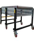 Hefty Expandable Roller Conveyor Adjustable From 47 To 118 Inches Long Heavy Duty Steel Beams And Pallet Moving System on casters.