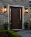 Westover 17 Inch Outdoor Wall Sconce 1 Light Earth Black Finish flanking a front door, clear beveled glass, mounted on brick wall